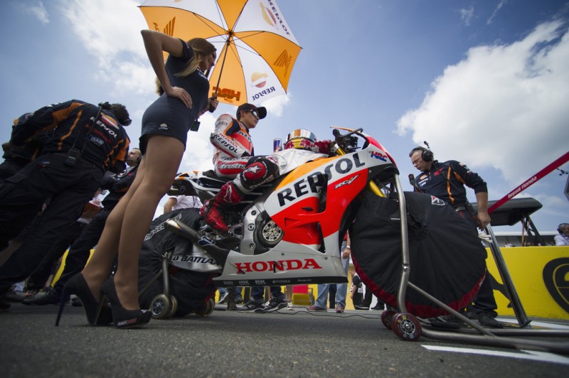 Marc Marquez of Spain and Repsol Honda Team prepares to start on the grid during the MotoGP race during the MotoGp of Germany - Race at Sachsenring Circuit on July 14, 2013 in Hohenstein-Ernstthal, Germany. 