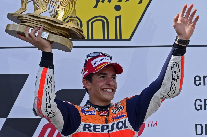 Marc Marquez of Spain and Repsol Honda Team celebrates the victory at the end of the MotoGP race during the MotoGp of Germany - Race at Sachsenring Circuit on July 14, 2013 in Hohenstein-Ernstthal, Germany. 