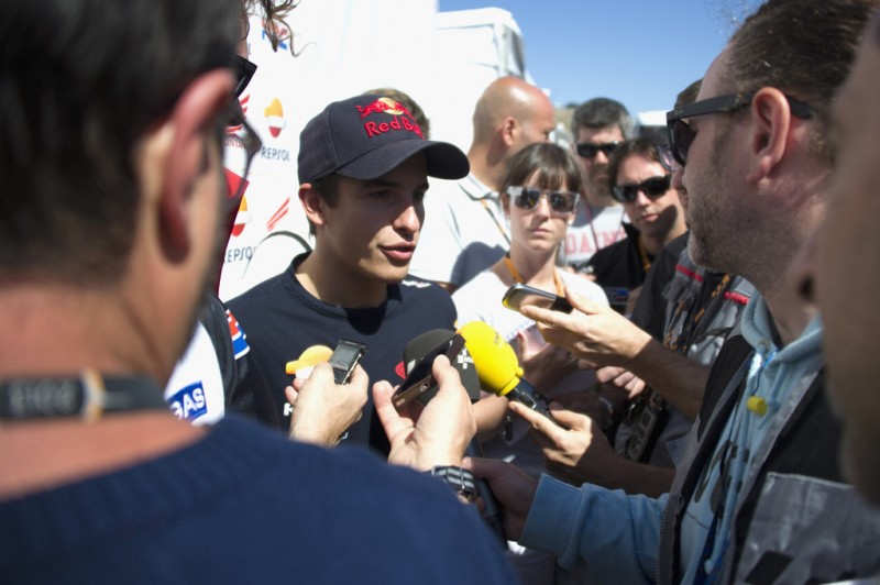 Marc Marquez of Spain and Repsol Honda Team speaks with journalists in paddock during the MotoGp Red Bull U.S. Grand Prix - Free Practice at Mazda Raceway Laguna Seca on July 19, 2013 in Monterey, California.