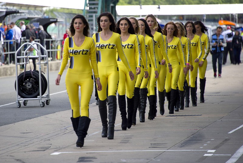 The gird girl walk in pit during the MotoGP race during the MotoGp Of Great Britain - Race at Silverstone Circuit on August 31, 2014 in Northampton, United Kingdom. 