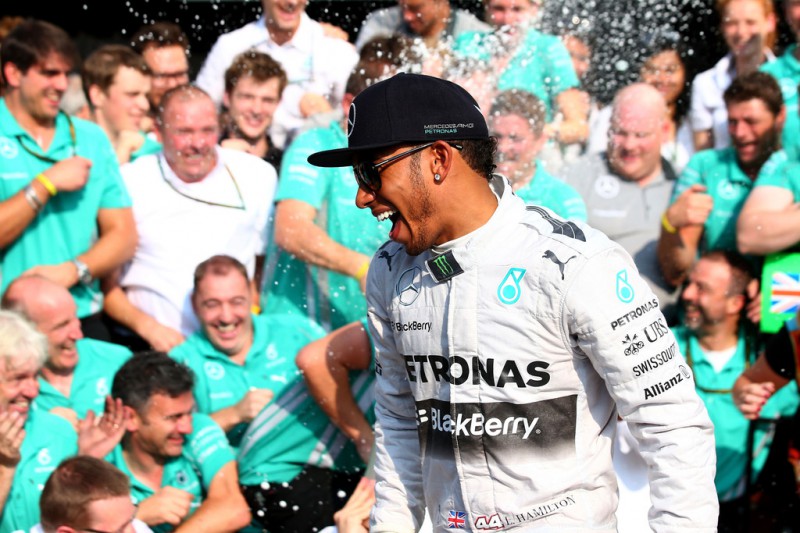Lewis Hamilton of Great Britain and Mercedes GP celebrates his victory with his team during the F1 Grand Prix of Italy at Autodromo di Monza on September 7, 2014 in Monza, Italy. 