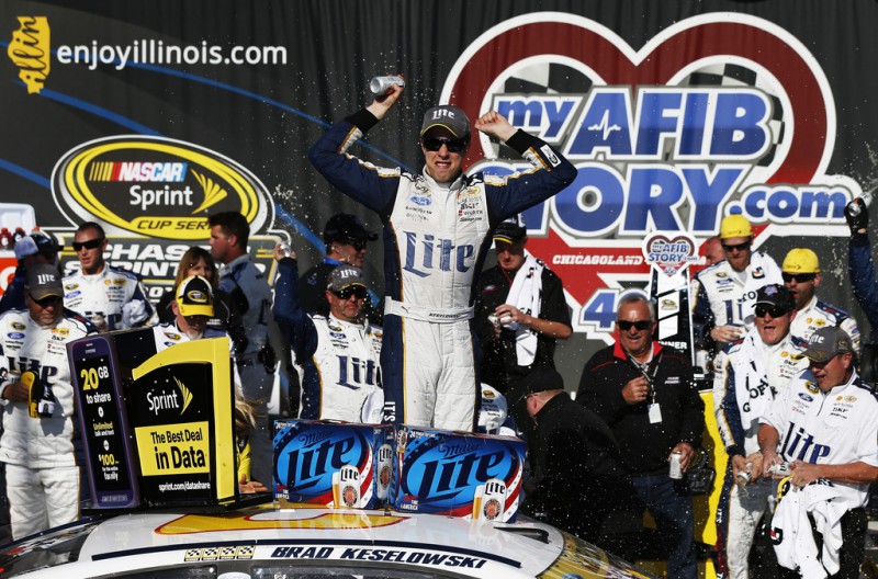Brad Keselowski, driver of the #2 Miller Lite Ford, celebrates in victory lane after winning the NASCAR Sprint Cup Series MyAFibStory.com 400 at Chicagoland Speedway on September 14, 2014 in Joliet, Illinois. 