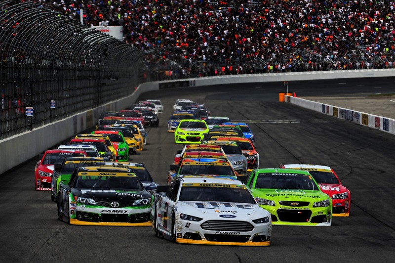 Brad Keselowski, driver of the #2 Miller Lite Ford, leads the field during the NASCAR Sprint Cup Series Sylvania 300 at New Hampshire Motor Speedway on September 21, 2014 in Loudon, New Hampshire. 