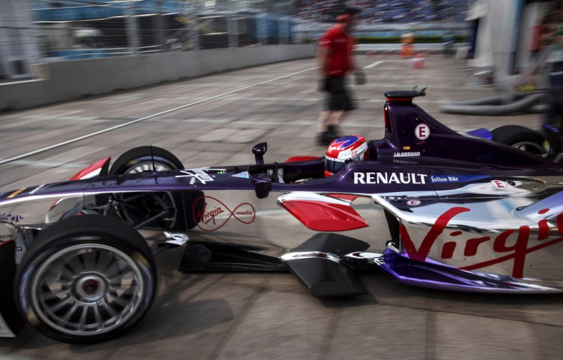 Virgin driver Jaime Alguersuari drives out of the pit garage during practice at the inaugral FIA Formula E Bejing ePrix Championship on September 13, 2014 in Beijing, China. The electric car racing series, is backed by many of the major sponsors of the main Formula One circuit, and is set to be hosted in nine other cities worldwide. 