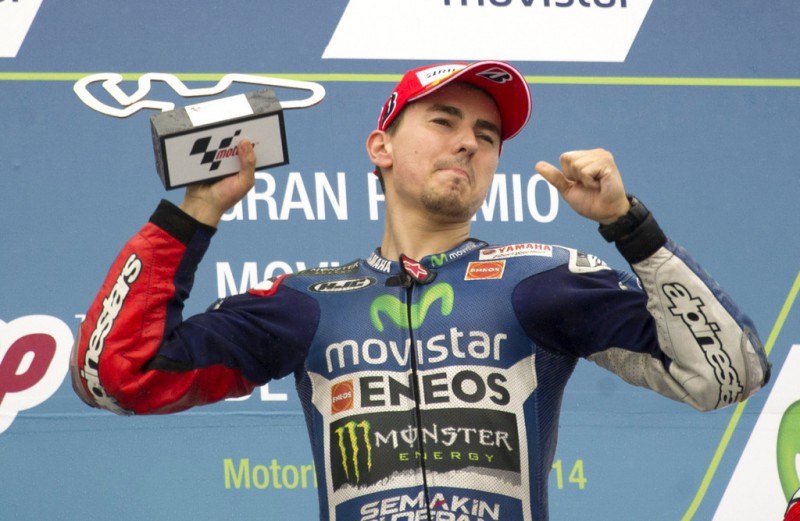 Jorge Lorenzo of Spain and Movistar Yamaha MotoGP celebrates with team the MotoGP victory at the end of the MotoGP race at Motorland Aragon Circuit on September 28, 2014 in Alcaniz, Spain. 