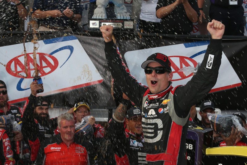 Jeff Gordon, driver of the #24 Drive To End Hunger Chevrolet, celebrates in Victory Lane after winning the NASCAR Sprint Cup Series AAA 400 at Dover International Speedway on September 28, 2014 in Dover, Delaware. 