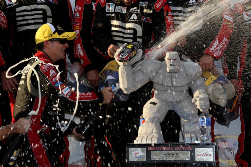 Jeff Gordon, driver of the #24 Drive To End Hunger Chevrolet, celebrates with his team in Victory Lane after winning the NASCAR Sprint Cup Series AAA 400 at Dover International Speedway on September 28, 2014 in Dover, Delaware. 