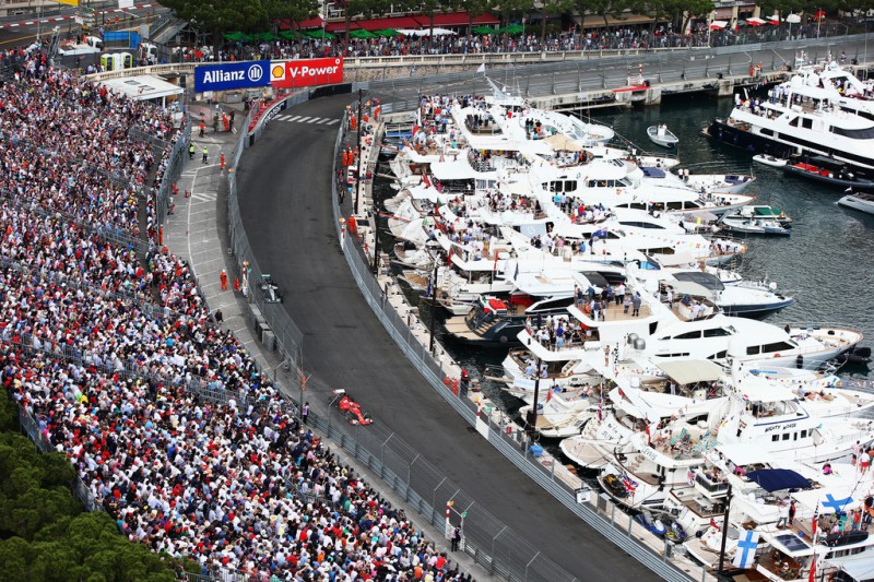 Sebastian Vettel of Germany and Ferrari leads from Lewis Hamilton of Great Britain and Mercedes GP during the Monaco Formula One Grand Prix at Circuit de Monaco on May 24, 2015 in Monte-Carlo, Monaco.