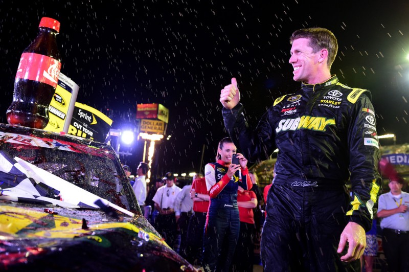 Carl Edwards, driver of the #19 Subway Toyota, celebrates in Victory Lane after winning the NASCAR Sprint Cup Series Coca-Cola 600 at Charlotte Motor Speedway on May 24, 2015 in Charlotte, North Carolina. 
