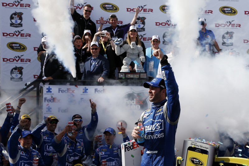 Jimmie Johnson, driver of the #48 Lowe's Pro Services Chevrolet, celebrates in Victory Lane after winning the NASCAR Sprint Cup Series FedEx 400 Benefiting Autism Speaks at Dover International Speedway on May 31, 2015 in Dover, Delaware. 