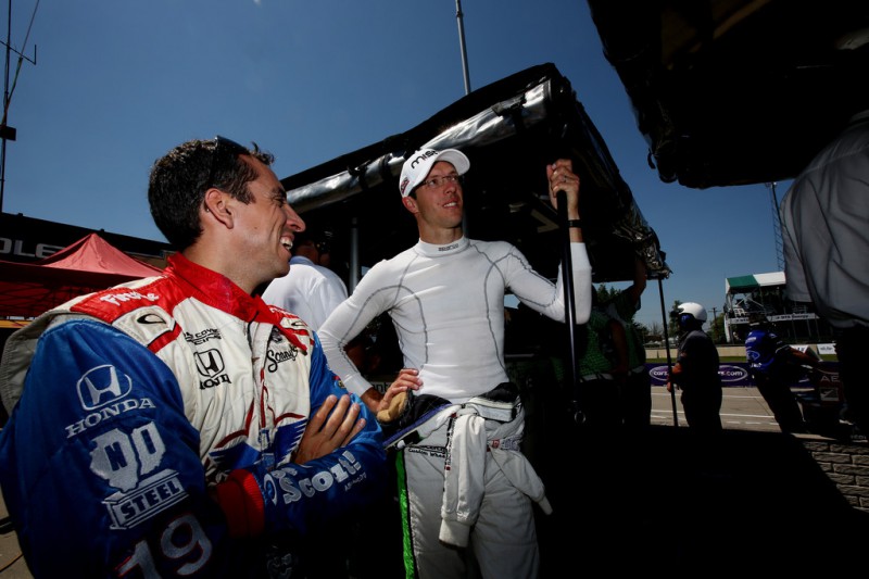 Justin Wilson of England, driver of the #19 Dale Coyne Racing Dallara Honda talks with Sebastien Bourdais of France, driver of the #11 KVSH Racing Dallara Chevrolet during practice for the Verizon IndyCar Series 2014 Chevrolet Indy Dual in Detroit at The Raceway on Belle Isle on May 30, 2014 in Detroit, Michigan. 