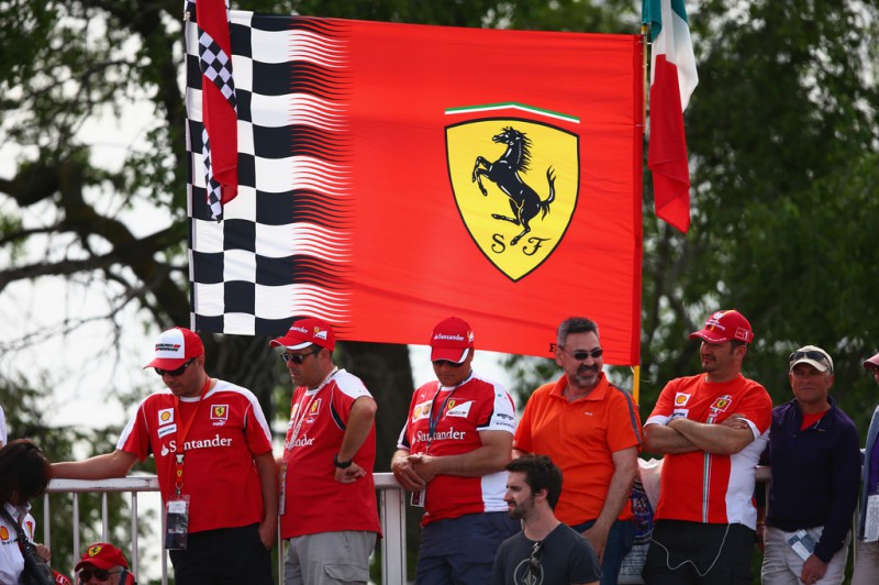 Dejected Ferrari fans look on during the Canadian Formula One Grand Prix at Circuit Gilles Villeneuve on June 7, 2015 in Montreal, Canada. 
