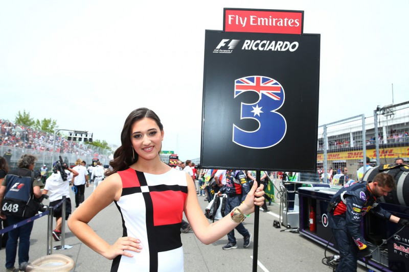 A grid girl holds up the grid marker belonging to Daniel Ricciardo of Australia and Infiniti Red Bull Racing during the Canadian Formula One Grand Prix at Circuit Gilles Villeneuve on June 7, 2015 in Montreal, Canada. 