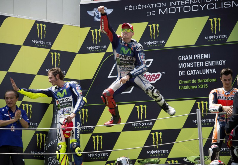 (L-R) Valentino Rossi of Italy and Movistar Yamaha MotoGP, Jorge Lorenzo of Spain and Repsol Honda Team and Dani Pedrosa of Spain and Repsol Honda Team celebrate on the podium at the end of the MotoGP race during the MotoGp of Catalunya - Race at Circuit de Catalunya on June 14, 2015 in Montmelo, Spain. 