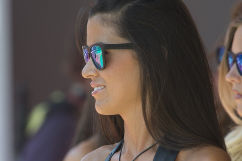 A grid girl poses under the podium at the end of the Moto3 race during the MotoGp of Catalunyae at Circuit de Catalunya on June 14, 2015 in Montmelo, Spain. 