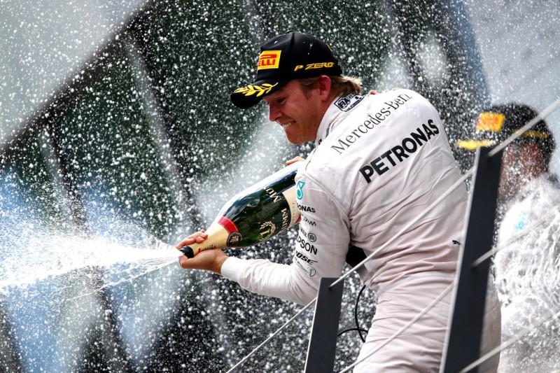 Nico Rosberg of Germany and Mercedes GP celebrates on the podium after winning the Formula One Grand Prix of Austria at Red Bull Ring on June 21, 2015 in Spielberg, Austria.
