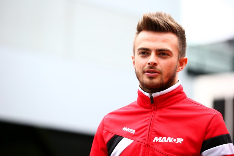 Will Stevens of Great Britain and Manor Marussia walks through the paddock during the Formula One Grand Prix of Austria at Red Bull Ring on June 21, 2015 in Spielberg, Austria. 