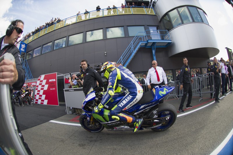 Valentino Rossi of Italy and Movistar Yamaha MotoGP celebrates the victory under the podium at the end of the MotoGP race during the MotoGP Netherlands - Race at on June 27, 2015 in Assen, Netherlands. Valentino Rossi of Italy and Movistar Yamaha MotoGP celebrates the victory under the podium at the end of the MotoGP race during the MotoGP Netherlands - Race at on June 27, 2015 in Assen, Netherlands.