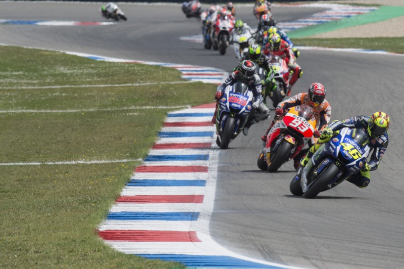 Valentino Rossi of Italy and Movistar Yamaha MotoGP leads the field. during the MotoGP race during the MotoGP Netherlands - Race at on June 27, 2015 in Assen, Netherlands. Valentino Rossi of Italy and Movistar Yamaha MotoGP leads the field. during the MotoGP race during the MotoGP Netherlands - Race at on June 27, 2015 in Assen, Netherlands.
