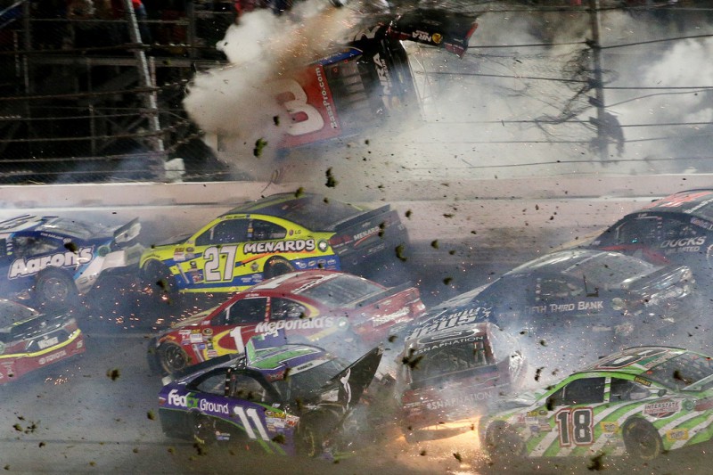 Austin Dillon, driver of the #3 Bass Pro Shops Chevrolet, is involved in an on-track incident following the checkered flag during the NASCAR Sprint Cup Series Coke Zero 400 Powered by Coca-Cola at Daytona International Speedway on July 6, 2015 in Daytona Beach, Florida. Austin Dillon, driver of the #3 Bass Pro Shops Chevrolet, is involved in an on-track incident following the checkered flag during the NASCAR Sprint Cup Series Coke Zero 400 Powered by Coca-Cola at Daytona International Speedway on July 6, 2015 in Daytona Beach, Florida.
