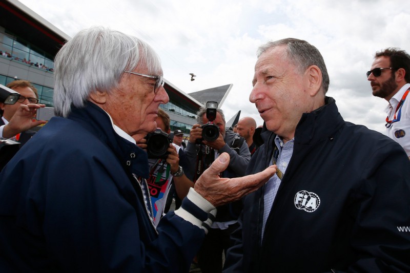 F1 supremo Bernie Ecclestone speaks with FIA President Jean Todt on the grid before the Formula One Grand Prix of Great Britain at Silverstone Circuit on July 5, 2015 in Northampton, England. 