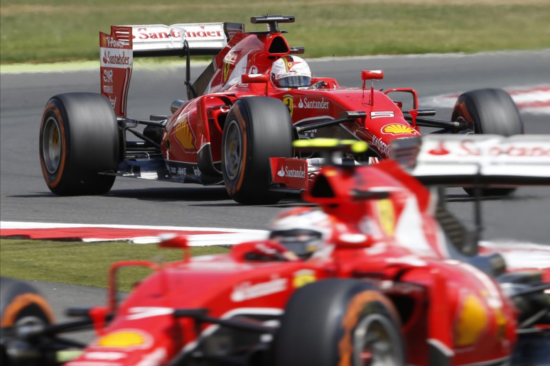 Sebastian Vettel of Germany and Ferrari drives during the Formula One Grand Prix of Great Britain at Silverstone Circuit on July 5, 2015 in Northampton, England. 
