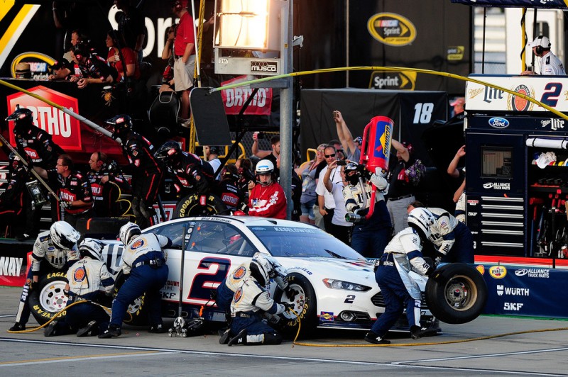Brad Keselowski, driver of the #2 Miller Lite Ford, pits during the NASCAR Sprint Cup Series Quaker State 400 presented by Advance Auto Parts at Kentucky Speedway on July 11, 2015 in Sparta, Kentucky. 