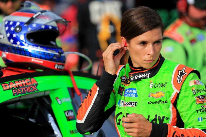 Danica Patrick, driver of the #10 GoDaddy Chevrolet, prepares her equipment on the grid prior to the NASCAR Sprint Cup Series Quaker State 400 presented by Advance Auto Parts at Kentucky Speedway on July 11, 2015 in Sparta, Kentucky. Danica Patrick, driver of the #10 GoDaddy Chevrolet, prepares her equipment on the grid prior to the NASCAR Sprint Cup Series Quaker State 400 presented by Advance Auto Parts at Kentucky Speedway on July 11, 2015 in Sparta, Kentucky.
