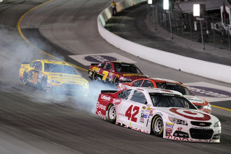 Kyle Larson, driver of the #42 Target Chevrolet, is involved in an on-track incident during the NASCAR Sprint Cup Series Quaker State 400 presented by Advance Auto Parts at Kentucky Speedway on July 11, 2015 in Sparta, Kentucky. Kyle Larson, driver of the #42 Target Chevrolet, is involved in an on-track incident during the NASCAR Sprint Cup Series Quaker State 400 presented by Advance Auto Parts at Kentucky Speedway on July 11, 2015 in Sparta, Kentucky.