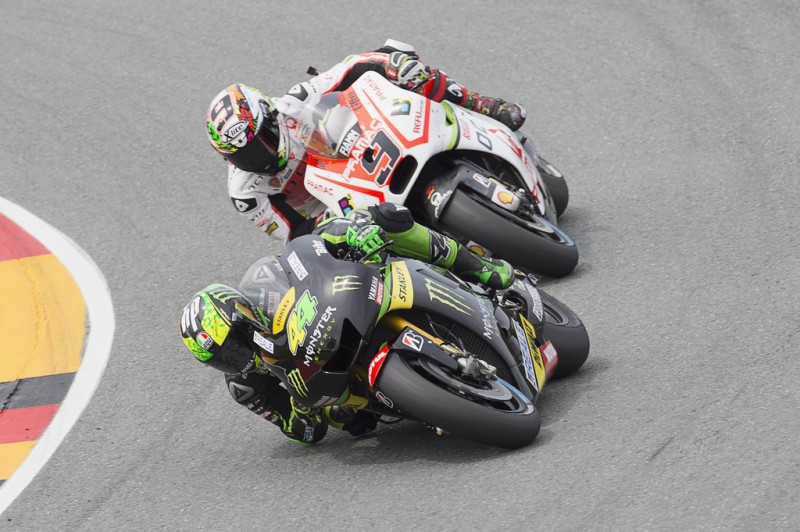 Pol Espargaro of Spain and Monster Yamaha Tech 3 leads Danilo Petrucci of Italy and Pramac Racing during the MotoGP race during the MotoGp of Germany - Race at Sachsenring Circuit on July 12, 2015 in Hohenstein-Ernstthal, Germany. 