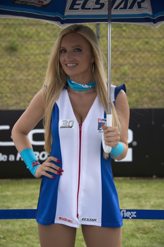A grid girl poses on the grid during the MotoGP race during the MotoGp of Germany - Race at Sachsenring Circuit on July 12, 2015 in Hohenstein-Ernstthal, Germany. A grid girl poses on the grid during the MotoGP race during the MotoGp of Germany - Race at Sachsenring Circuit on July 12, 2015 in Hohenstein-Ernstthal, Germany.