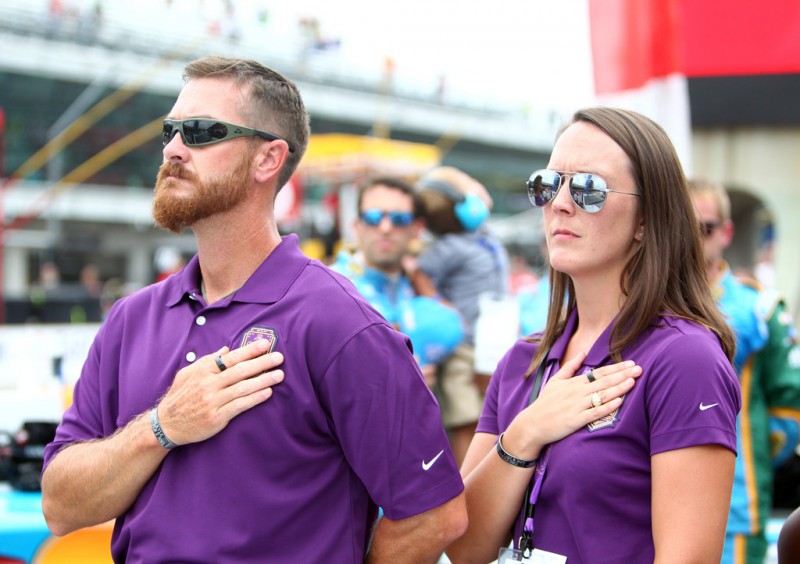 Crown Royal "Your Hero's Name Here" winner and Brickyard 400 race namesake Jeff Kyle with his wife Amy Kyle visit Indianapolis Motor Speedway on July 26, 2015 in Indianapolis, Indiana. Crown Royal "Your Hero's Name Here" winner and Brickyard 400 race namesake Jeff Kyle with his wife Amy Kyle visit Indianapolis Motor Speedway on July 26, 2015 in Indianapolis, Indiana.