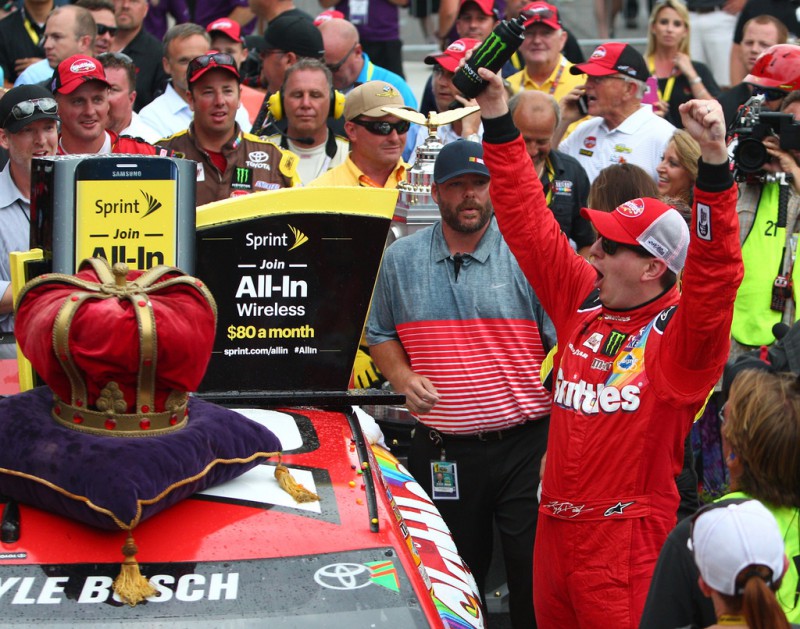Kyle Busch celebrates after winning the Crown Royal Presents The Jeff Kyle 400 At The Brickyard at Indianapolis Motorspeedway on July 26, 2015 in Indianapolis, Indiana. Kyle Busch celebrates after winning the Crown Royal Presents The Jeff Kyle 400 At The Brickyard at Indianapolis Motorspeedway on July 26, 2015 in Indianapolis, Indiana.