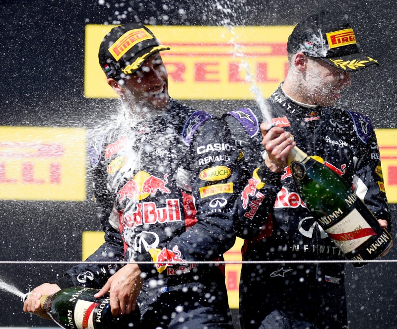 Daniel Ricciardo of Australia and Infiniti Red Bull Racing and Daniil Kvyat of Russia and Infiniti Red Bull Racing celebrate on the podium after finsihing third and second during the Formula One Grand Prix of Hungary at Hungaroring on July 26, 2015 in Budapest, Hungary. Daniel Ricciardo of Australia and Infiniti Red Bull Racing and Daniil Kvyat of Russia and Infiniti Red Bull Racing celebrate on the podium after finsihing third and second during the Formula One Grand Prix of Hungary at Hungaroring on July 26, 2015 in Budapest, Hungary.