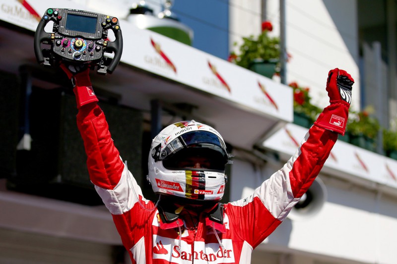 Sebastian Vettel of Germany and Ferrari celebrates in Parc Ferme after winning the Formula One Grand Prix of Hungary at Hungaroring on July 26, 2015 in Budapest, Hungary. Sebastian Vettel of Germany and Ferrari celebrates in Parc Ferme after winning the Formula One Grand Prix of Hungary at Hungaroring on July 26, 2015 in Budapest, Hungary.