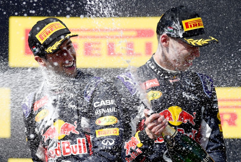 Daniel Ricciardo of Australia and Infiniti Red Bull Racing and Daniil Kvyat of Russia and Infiniti Red Bull Racing celebrate on the podium after finsihing third and second during the Formula One Grand Prix of Hungary at Hungaroring on July 26, 2015 in Budapest, Hungary. Daniel Ricciardo of Australia and Infiniti Red Bull Racing and Daniil Kvyat of Russia and Infiniti Red Bull Racing celebrate on the podium after finsihing third and second during the Formula One Grand Prix of Hungary at Hungaroring on July 26, 2015 in Budapest, Hungary.