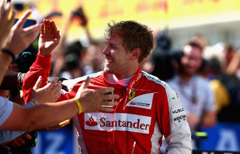 Sebastian Vettel of Germany and Ferrari celebrates in Parc Ferme after winning the Formula One Grand Prix of Hungary at Hungaroring on July 26, 2015 in Budapest, Hungary. Sebastian Vettel of Germany and Ferrari celebrates in Parc Ferme after winning the Formula One Grand Prix of Hungary at Hungaroring on July 26, 2015 in Budapest, Hungary.