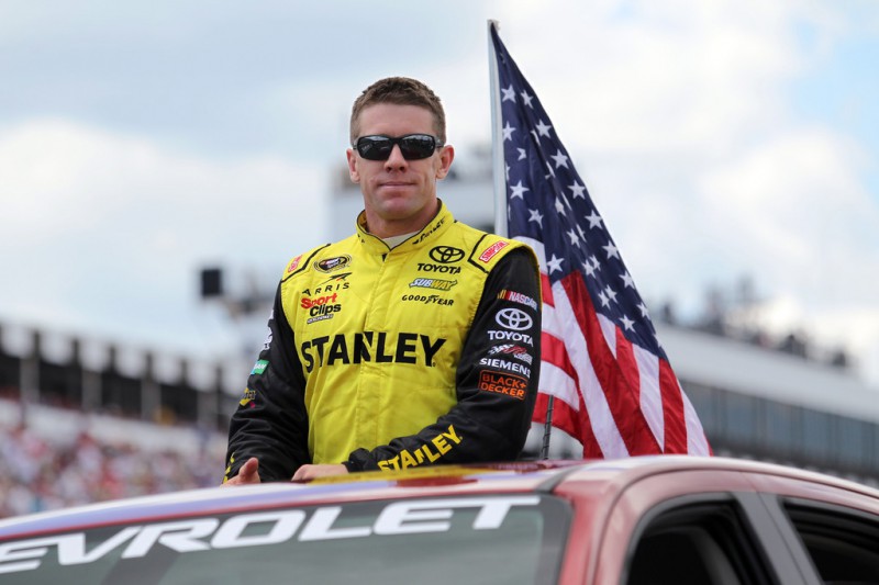 Carl Edwards, driver of the #19 Stanley Toyota, is introduced prior to the NASCAR Sprint Cup Series Windows 10 400 at Pocono Raceway on August 2, 2015 in Long Pond, Pennsylvania. 