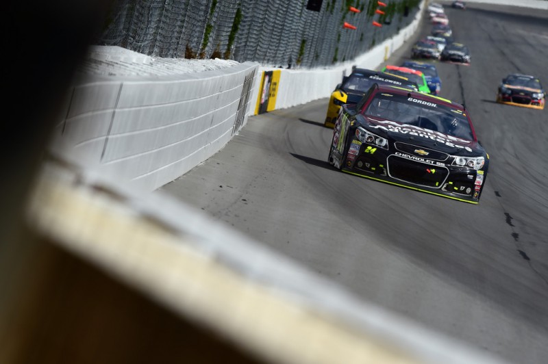 Jeff Gordon, driver of the #24 AARP Member Advantages Chevrolet, races during the NASCAR Sprint Cup Series Windows 10 400 at Pocono Raceway on August 2, 2015 in Long Pond, Pennsylvania. 