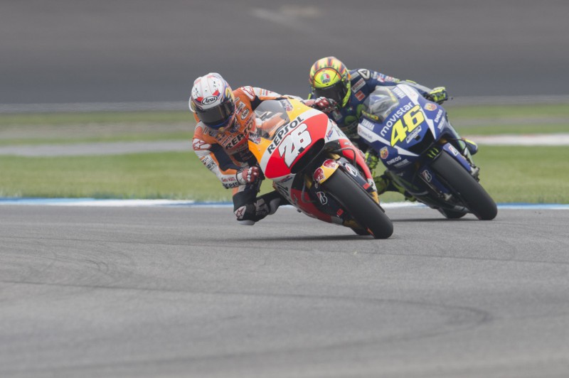 Dani Pedrosa of Spain and Repsol Honda Team leads Valentino Rossi of Italy and Movistar Yamaha MotoGP during the MotoGP race during the MotoGp Red Bull U.S. Indianapolis Grand Prix - Race at Indianapolis Motor Speedway on August 9, 2015 in Indianapolis, Indiana. Dani Pedrosa of Spain and Repsol Honda Team leads Valentino Rossi of Italy and Movistar Yamaha MotoGP during the MotoGP race during the MotoGp Red Bull U.S. Indianapolis Grand Prix - Race at Indianapolis Motor Speedway on August 9, 2015 in Indianapolis, Indiana.
