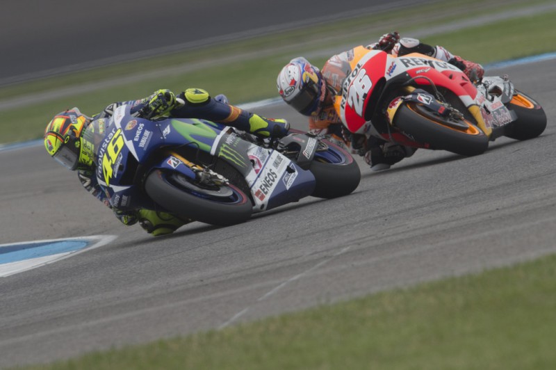 Valentino Rossi of Italy and Movistar Yamaha MotoGP leads Dani Pedrosa of Spain and Repsol Honda Team during the MotoGP race during the MotoGp Red Bull U.S. Indianapolis Grand Prix - Race at Indianapolis Motor Speedway on August 9, 2015 in Indianapolis, Indiana. Valentino Rossi of Italy and Movistar Yamaha MotoGP leads Dani Pedrosa of Spain and Repsol Honda Team during the MotoGP race during the MotoGp Red Bull U.S. Indianapolis Grand Prix - Race at Indianapolis Motor Speedway on August 9, 2015 in Indianapolis, Indiana.