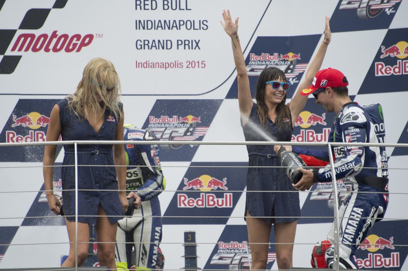 Jorge Lorenzo of Spain and Movistar Yamaha MotoGP celebrates the second place on the podium with the girls at the end of the MotoGP race during the MotoGp Red Bull U.S. Indianapolis Grand Prix - Race at Indianapolis Motor Speedway on August 9, 2015 in Indianapolis, Indiana. Jorge Lorenzo of Spain and Movistar Yamaha MotoGP celebrates the second place on the podium with the girls at the end of the MotoGP race during the MotoGp Red Bull U.S. Indianapolis Grand Prix - Race at Indianapolis Motor Speedway on August 9, 2015 in Indianapolis, Indiana.