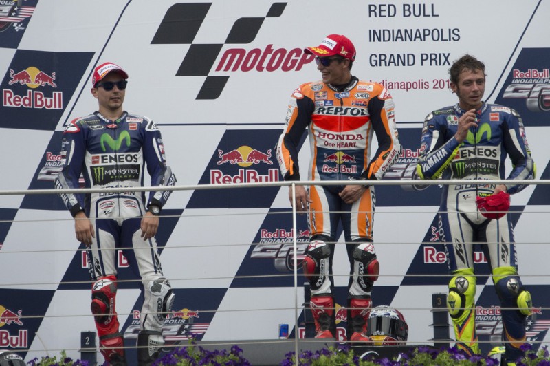 (L-R) Jorge Lorenzo of Spain and Movistar Yamaha MotoGP, Marc Marquez of Spain and Repsol Honda Team and Valentino Rossi of Italy and Movistar Yamaha MotoGP pose on the podium at the end of the MotoGP race during the MotoGp Red Bull U.S. Indianapolis Grand Prix - Race at Indianapolis Motor Speedway on August 9, 2015 in Indianapolis, Indiana. (L-R) Jorge Lorenzo of Spain and Movistar Yamaha MotoGP, Marc Marquez of Spain and Repsol Honda Team and Valentino Rossi of Italy and Movistar Yamaha MotoGP pose on the podium at the end of the MotoGP race during the MotoGp Red Bull U.S. Indianapolis Grand Prix - Race at Indianapolis Motor Speedway on August 9, 2015 in Indianapolis, Indiana.