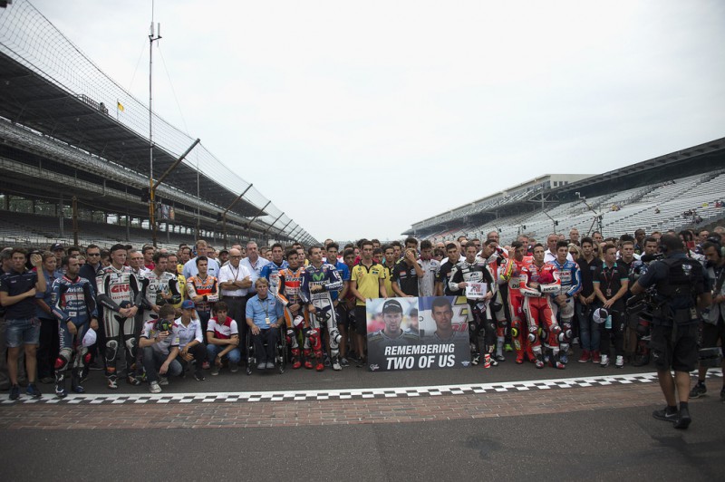 The MotoGP riders observe a moment for two riders during the MotoGP race during the MotoGp Red Bull U.S. Indianapolis Grand Prix - Race at Indianapolis Motor Speedway on August 9, 2015 in Indianapolis, Indiana. The MotoGP riders observe a moment for two riders during the MotoGP race during the MotoGp Red Bull U.S. Indianapolis Grand Prix - Race at Indianapolis Motor Speedway on August 9, 2015 in Indianapolis, Indiana.