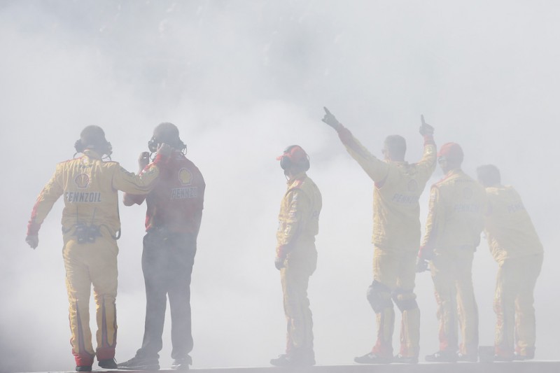 Crew members of Joey Logano, driver of the #22 Shell Pennzoil Ford, celebrate after winning the NASCAR Sprint Cup Series Cheez-It 355 at the Glen at Watkins Glen International on August 9, 2015 in Watkins Glen, New York. Crew members of Joey Logano, driver of the #22 Shell Pennzoil Ford, celebrate after winning the NASCAR Sprint Cup Series Cheez-It 355 at the Glen at Watkins Glen International on August 9, 2015 in Watkins Glen, New York.