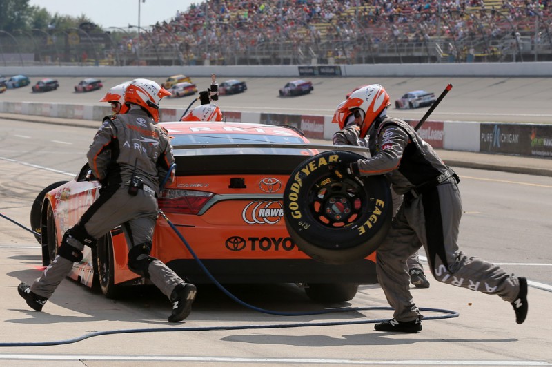 Carl Edwards, driver of the #19 ARRIS Toyota, pits during the NASCAR Sprint Cup Series Pure Michigan 400 at Michigan International Speedway on August 16, 2015 in Brooklyn, Michigan. Carl Edwards, driver of the #19 ARRIS Toyota, pits during the NASCAR Sprint Cup Series Pure Michigan 400 at Michigan International Speedway on August 16, 2015 in Brooklyn, Michigan.