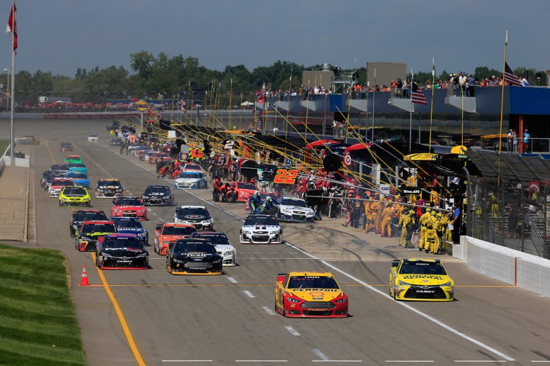 Drivers exit the pits during the NASCAR Sprint Cup Series Pure Michigan 400 at Michigan International Speedway on August 16, 2015 in Brooklyn, Michigan. Drivers exit the pits during the NASCAR Sprint Cup Series Pure Michigan 400 at Michigan International Speedway on August 16, 2015 in Brooklyn, Michigan.