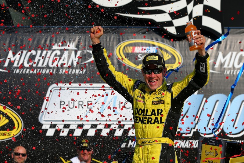 Matt Kenseth, driver of the #20 Dollar General Toyota, celebrates in victory lane after winning the NASCAR Sprint Cup Series Pure Michigan 400 at Michigan International Speedway on August 16, 2015 in Brooklyn, Michigan. Matt Kenseth, driver of the #20 Dollar General Toyota, celebrates in victory lane after winning the NASCAR Sprint Cup Series Pure Michigan 400 at Michigan International Speedway on August 16, 2015 in Brooklyn, Michigan.