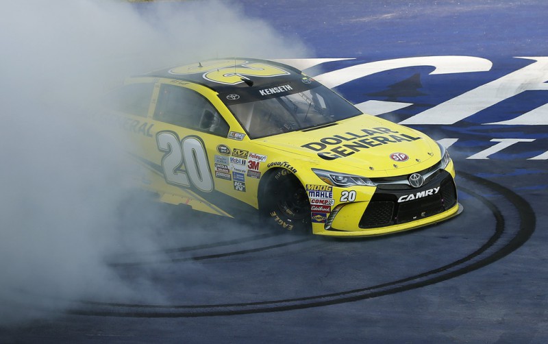 Matt Kenseth, driver of the #20 Dollar General Toyota, celebrates with a burnout after winning the NASCAR Sprint Cup Series Pure Michigan 400 at Michigan International Speedway on August 16, 2015 in Brooklyn, Michigan. Matt Kenseth, driver of the #20 Dollar General Toyota, celebrates with a burnout after winning the NASCAR Sprint Cup Series Pure Michigan 400 at Michigan International Speedway on August 16, 2015 in Brooklyn, Michigan.