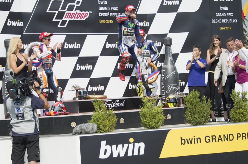 Jorge Lorenzo of Spain and Movistar Yamaha MotoGP celebrates the victory on the podium at the end of the MotoGP race during the MotoGp of Czech Republic - Race at Brno Circuit on August 16, 2015 in Brno, Czech Republic. Jorge Lorenzo of Spain and Movistar Yamaha MotoGP celebrates the victory on the podium at the end of the MotoGP race during the MotoGp of Czech Republic - Race at Brno Circuit on August 16, 2015 in Brno, Czech Republic.